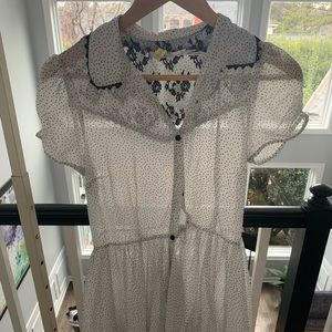 Polka dot dress mid length black detail on bottom